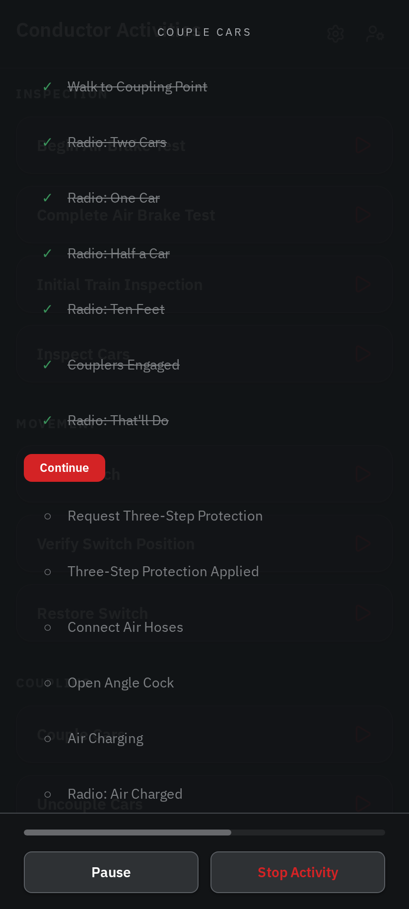 Couple Cars holding at a wait point with a Continue button